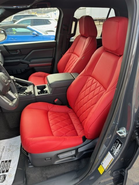 Red leather front seats with diamond-stitched inserts